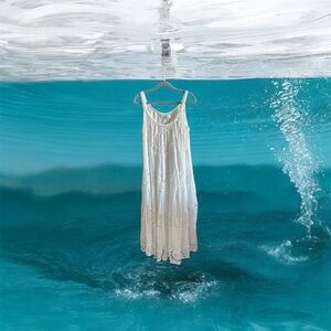 Here’s a casual English translation:

“Beautiful Signature long dress